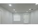 Bright room with recessed lighting and a back door at 814 W 131St Ave, Tampa, FL 33612