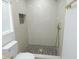 Shower with mosaic tile and gold hardware at 814 W 131St Ave, Tampa, FL 33612