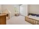 Cozy bedroom with natural light, wooden bed frame, play tent, and closet at 9126 Cypress Keep Ln, Odessa, FL 33556