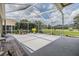Spacious screened patio with ample room for outdoor furniture and relaxation at 9126 Cypress Keep Ln, Odessa, FL 33556