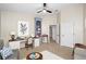 Bedroom with neutral colors, desk, and bookshelves at 10208 Westpark Preserve Blvd, Tampa, FL 33625
