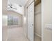 Bedroom with a ceiling fan and open closet at 10208 Westpark Preserve Blvd, Tampa, FL 33625