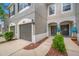 Townhouse with a neat walkway and a well-maintained exterior at 10208 Westpark Preserve Blvd, Tampa, FL 33625