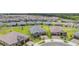 A beautiful aerial view of an attractive home in a desirable neighborhood with lush landscaping and community features at 10278 Otter Sky Ct, San Antonio, FL 33576