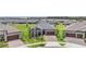 Overhead shot of a house with beautiful landscaping and a stylish facade, perfectly positioned in a Gathering-friendly community at 10278 Otter Sky Ct, San Antonio, FL 33576