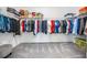 Well-organized walk-in closet with ample storage space for clothing and accessories at 10278 Otter Sky Ct, San Antonio, FL 33576