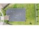 A top-down view showing the dark roof and lush green surroundings of the property at 10278 Otter Sky Ct, San Antonio, FL 33576