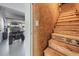 Stairway to upper level storage area with view of the garage and golf cart, blending function and convenience at 10278 Otter Sky Ct, San Antonio, FL 33576