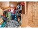 Finished storage area with shelving, bins, and seasonal items offering practical organization at 10278 Otter Sky Ct, San Antonio, FL 33576