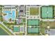 Aerial view of community tennis courts and pool at 10278 Otter Sky Ct, San Antonio, FL 33576