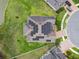 Aerial shot of the home's roof with solar panels on a large manicured lot at 10701 Morning Dew Way, Tampa, FL 33647