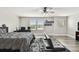 Bedroom features modern furniture, multiple windows, and stylish decor at 10701 Morning Dew Way, Tampa, FL 33647