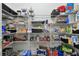 Organized pantry with wire shelving, baskets and a variety of food and storage items at 10701 Morning Dew Way, Tampa, FL 33647