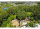 Aerial view of a playground with swings, slides, and climbing structures at 10701 Morning Dew Way, Tampa, FL 33647
