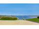 Scenic boat ramp leading to a tranquil lake, offering easy access for water activities at 12215 Blue Pacific Dr, Riverview, FL 33579