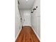 Inviting entryway features wood-look flooring, stylish lighting, and decorative wall trim at 12215 Blue Pacific Dr, Riverview, FL 33579