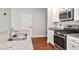 Kitchen featuring stainless appliances, granite counters, ample cabinet space, and modern design at 12215 Blue Pacific Dr, Riverview, FL 33579
