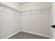 Walk-in closet with carpet and wire shelving at 12215 Blue Pacific Dr, Riverview, FL 33579