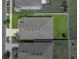 Aerial view of a backyard with a green lawn and white fence at 12931 Twin Bridges Dr, Riverview, FL 33579