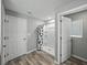 Bright bathroom featuring a walk-in shower and modern fixtures at 12931 Twin Bridges Dr, Riverview, FL 33579