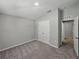 Spacious bedroom featuring a double-door closet and neutral carpeting at 12931 Twin Bridges Dr, Riverview, FL 33579