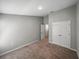 Spacious bedroom featuring a double-door closet and an entrance to another room at 12931 Twin Bridges Dr, Riverview, FL 33579