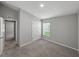Bedroom showcases a double door closet and an entrance to another room at 12931 Twin Bridges Dr, Riverview, FL 33579