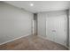 Spacious bedroom featuring a double-door closet and an entrance to another room at 12931 Twin Bridges Dr, Riverview, FL 33579