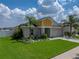 A lovely single-Gathering home with a well-manicured lawn, landscaping, and a two-car garage at 12931 Twin Bridges Dr, Riverview, FL 33579