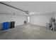 View of the spacious garage with room for storage and vehicles at 12931 Twin Bridges Dr, Riverview, FL 33579