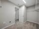 Walk-in closet with wire rack shelving and carpeted floors at 12931 Twin Bridges Dr, Riverview, FL 33579