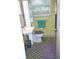 Well-lit bathroom with a clean white sink and toilet at 1317 Tyrone N Blvd, St Petersburg, FL 33710