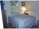 Bedroom with a bed, dresser and bright natural light at 1317 Tyrone N Blvd, St Petersburg, FL 33710