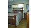 Bedroom featuring a wooden bed frame, side table, and natural lighting at 1317 Tyrone N Blvd, St Petersburg, FL 33710