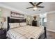 Primary bedroom featuring neutral paint, a ceiling fan, and dark furniture at 14096 Pullman Dr, Spring Hill, FL 34609
