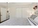 Another bedroom view showcases a double closet and access to a hallway at 1513 Loretta Ct, Brandon, FL 33511