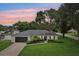 Charming single-story home featuring a well-manicured lawn and brick exterior at 1513 Loretta Ct, Brandon, FL 33511