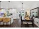 Dining area adjacent to the bright, well-equipped kitchen with stainless appliances at 1513 Loretta Ct, Brandon, FL 33511
