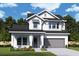 Charming two-story home with a gray two-car garage, white siding, black roof, and well-manicured front yard at 1559 Running Tide Pl, Sarasota, FL 34240