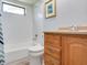 Bathroom with vanity and tub with showerhead at 1610 Sanderling Ct, Brandon, FL 33511