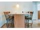 Eat-in dining area with granite countertop table and seating for four in a naturally lit space at 1610 Sanderling Ct, Brandon, FL 33511