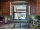 Kitchen sink with cabinets, view to patio at 1610 Sanderling Ct, Brandon, FL 33511