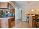 Spacious kitchen with breakfast bar seating and views to other rooms in the home at 1610 Sanderling Ct, Brandon, FL 33511