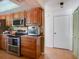 Efficient kitchen layout with stainless steel appliances, double oven and plenty of storage at 1610 Sanderling Ct, Brandon, FL 33511