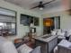 Cozy covered patio with comfortable seating, perfect for outdoor lounging and entertaining at 1610 Sanderling Ct, Brandon, FL 33511