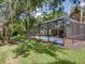 Beautiful backyard pool and screened lanai, perfect for relaxing at 1610 Sanderling Ct, Brandon, FL 33511