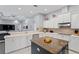 Bright and airy kitchen with white countertops, an island, and stainless steel appliances at 17807 Arbor Greene Dr, Tampa, FL 33647