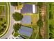 Aerial view of the home showcasing its position within the neighborhood and expansive backyard space at 18508 Merseyside Loop, Land O Lakes, FL 34638