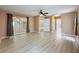 Bright living room with sliding doors, luxury flooring, and neutral paint at 18549 Grand Club Dr, Hudson, FL 34667