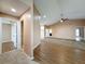 Open living area with hard surface floors leading to other living spaces at 18549 Grand Club Dr, Hudson, FL 34667